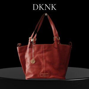This is a DKNY red pebbled leather tote bag